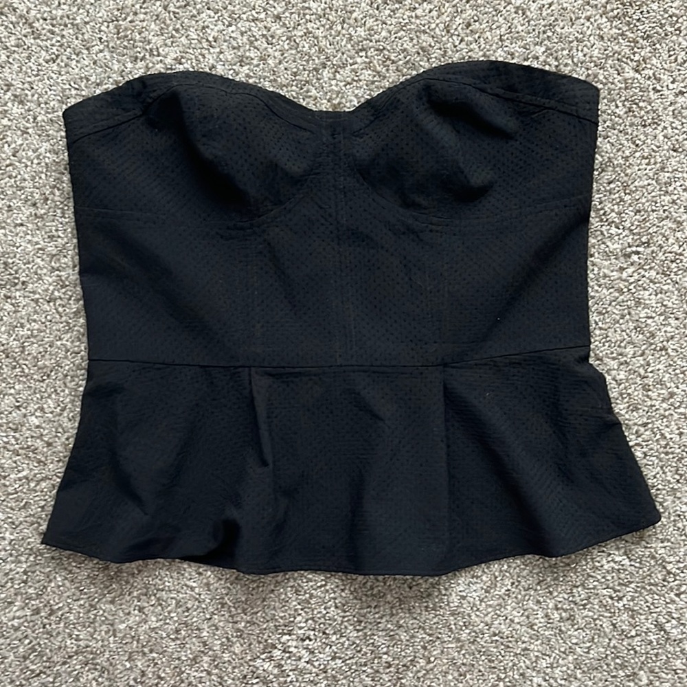 Express peplum tube top. Size 8. Only worn a few times. Zipper on back